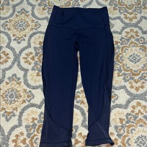 Lululemon navy blue capri leggings with mesh inserts